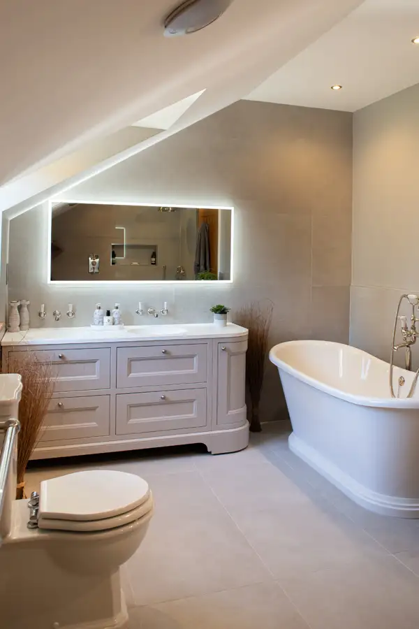 lefroy brooks bathroom. showing a bath, vanity unit, toilet and mirror.